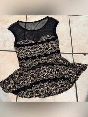 Black & gold lace peplum top with sequins and mesh details